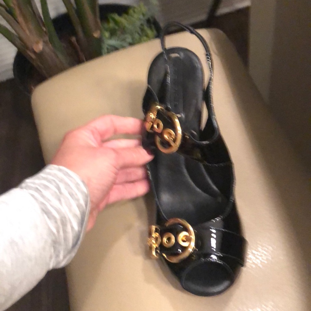 BCBG Maxaxria Black Patent Heels with gold buckles